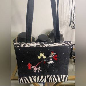 Lady walking dog hand stitched bag. Great for Xmas, or to wear with zebra.